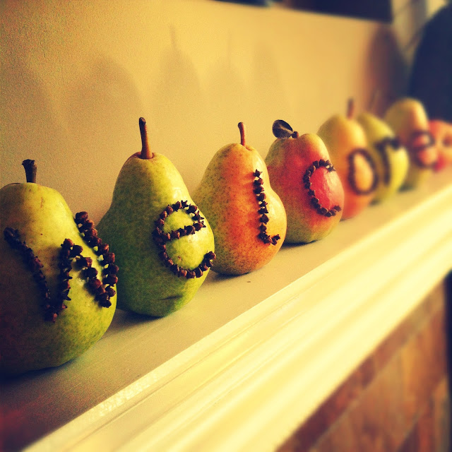Fall fresh fruit fireplace mantel decor Pear and clove welcome sign
