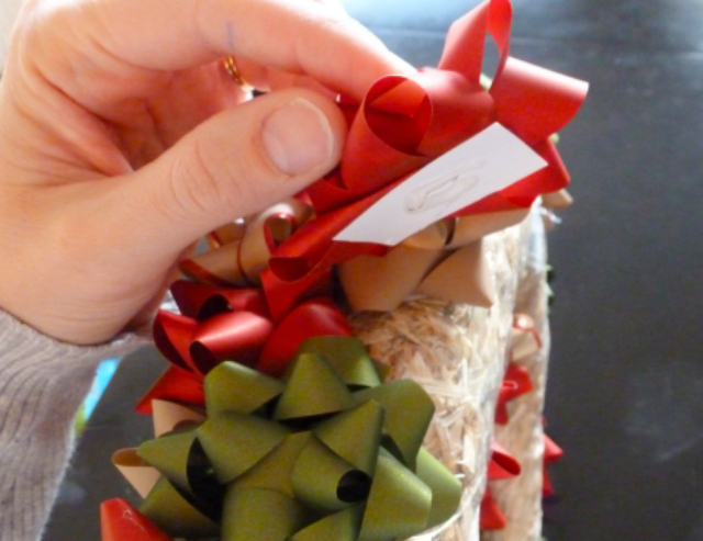 How to add hot glue to the back of the bows to make them extra secure