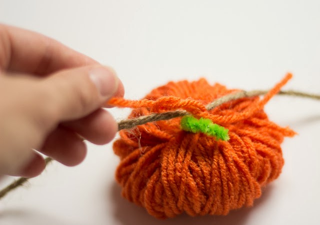 How to tie yarn pumpkins to a garland