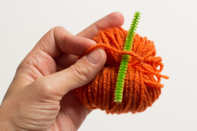 How to add a pipe cleaner stem to the yarn pumpkin