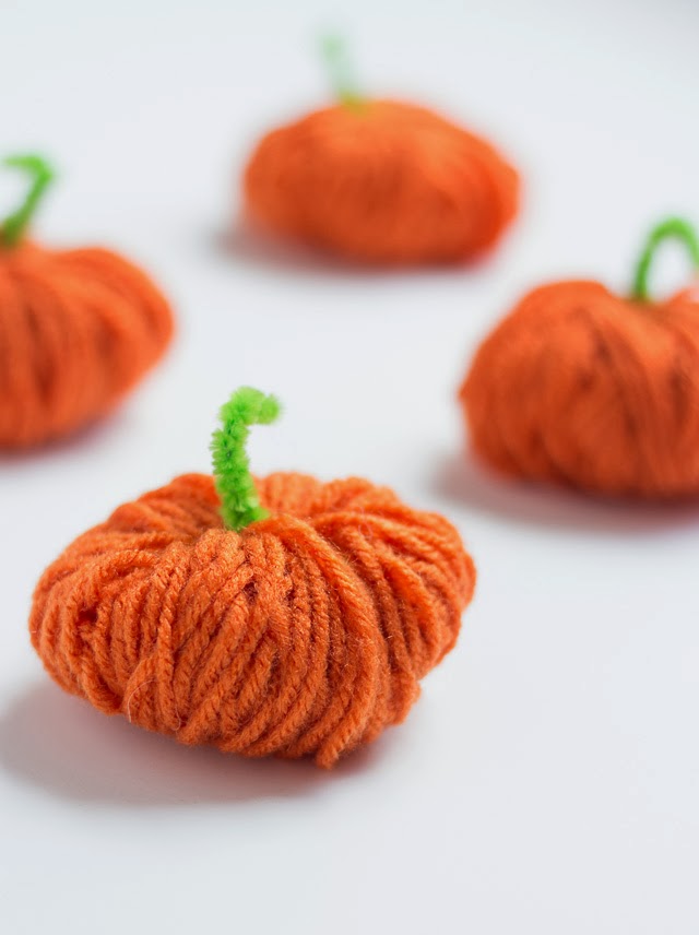 Yarn pumpkins with pipe cleaner stem