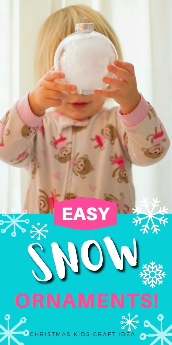 Child holding snow ornament