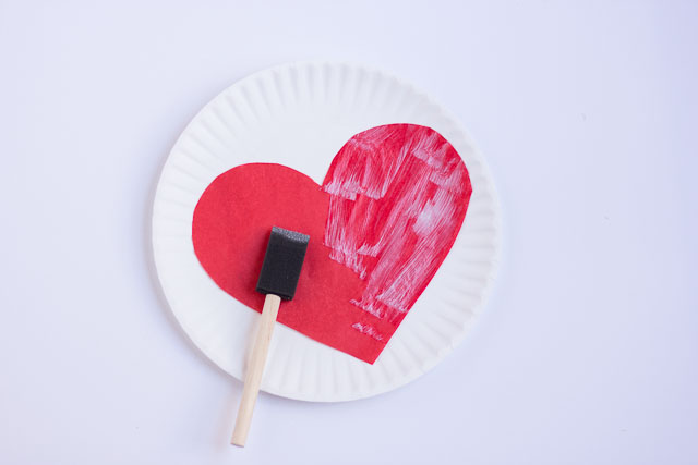 Make these DIY Valentine's Day heart balloons with Mod Podge and tissue paper!