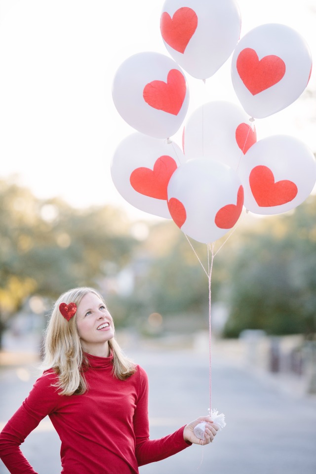 Make these DIY Valentine's Day heart balloons with Mod Podge and tissue paper!