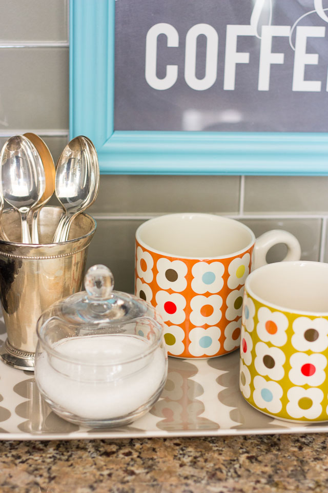 Tray with coffee mugs and sugar bowl