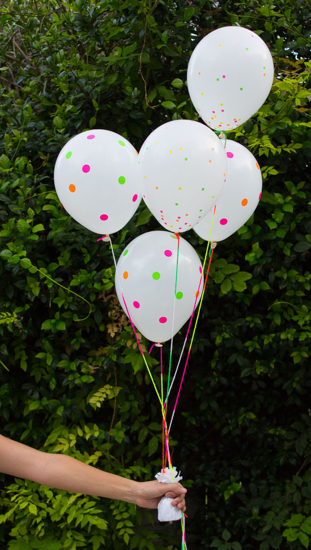 DIY Neon balloons using office supply stickers!