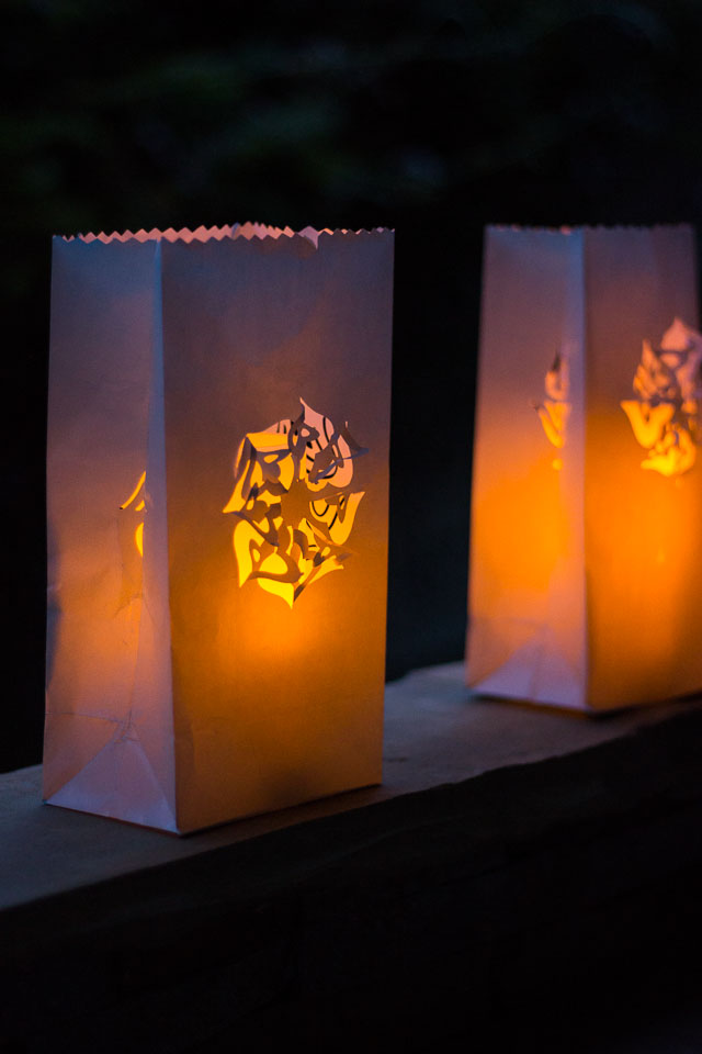 Paper Bag Luminaries - you can make beautiful designs in minutes simply by using a paper punch! || Design Improvised blog