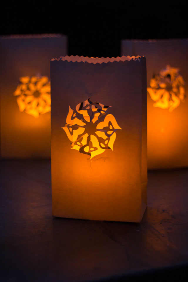 Paper Bag Luminaries - you can make beautiful designs in minutes simply by using a paper punch! || Design Improvised blog