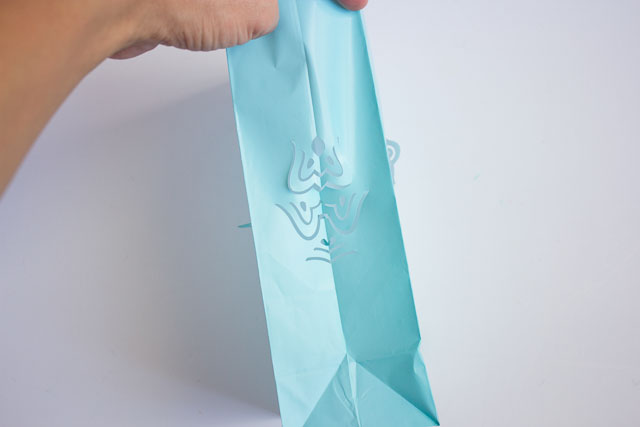 Paper Bag Luminaries - you can make beautiful designs in minutes simply by using a paper punch! || Design Improvised blog
