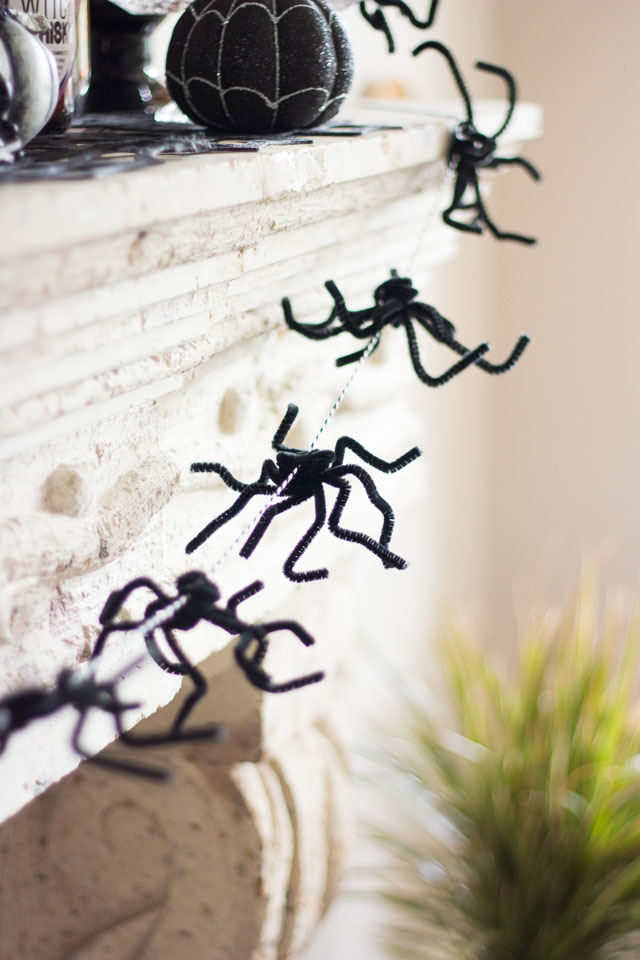 Pipe cleaners were meant to be spiders! Use them to whip of this simple Halloween spider garland in minutes. http://designimprovised.com