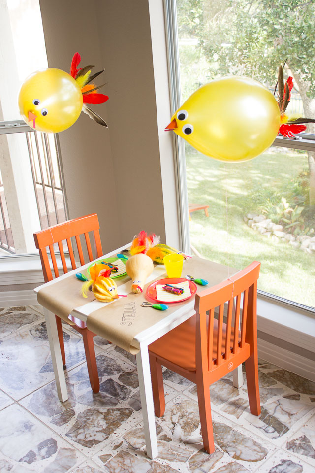 The Thanksgiving kids table with playful gourd turkeys and DIY turkey balloons! || http://www.designimprovised.com