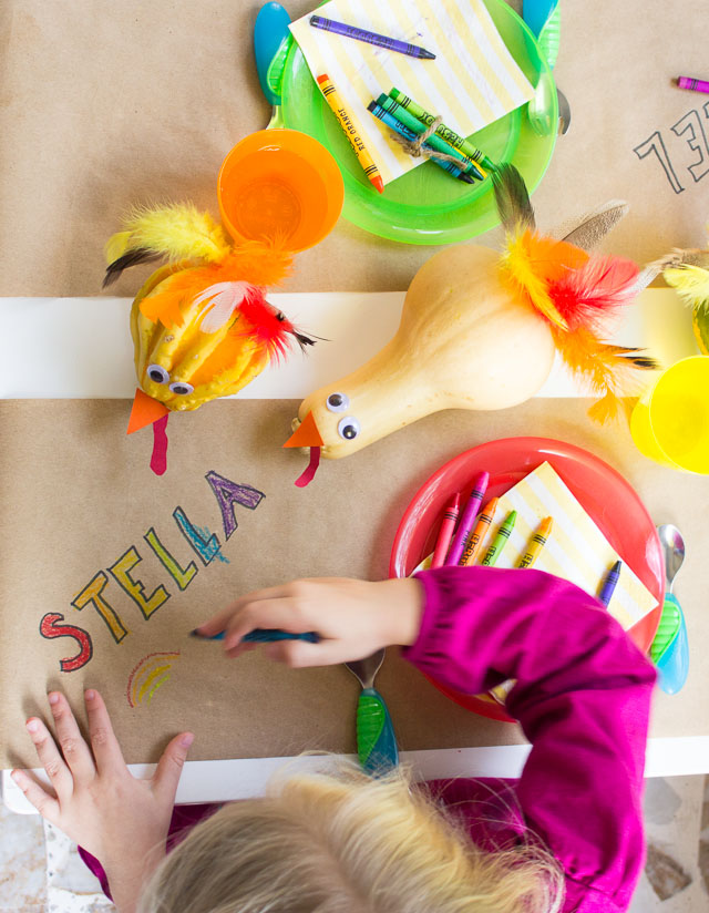 The Thanksgiving kids table with playful gourd turkeys and DIY turkey balloons! || http://www.designimprovised.com