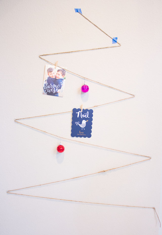 A simple way to display your holiday cards - you can make this tree as large as you want! || http://www.designimprovised.com