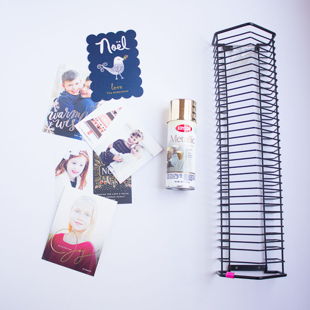 Turn an old CD rack into a modern holiday card display! || http://www.designimprovised.com