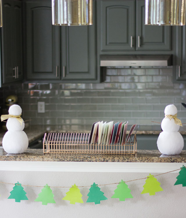 Turn an old CD rack into a modern holiday card display! || http://www.designimprovised.com
