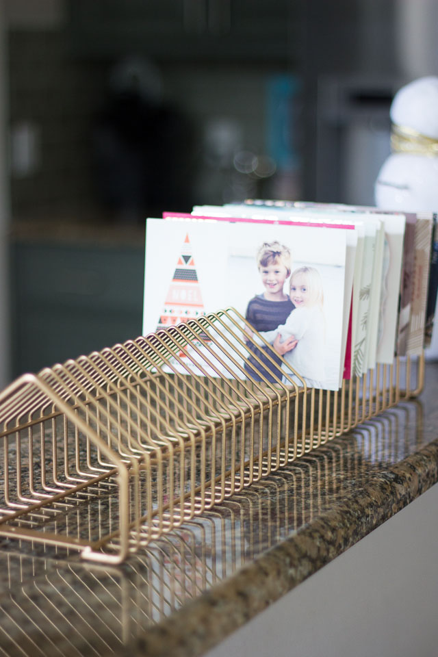 Turn an old CD rack into a modern holiday card display! || http://www.designimprovised.com