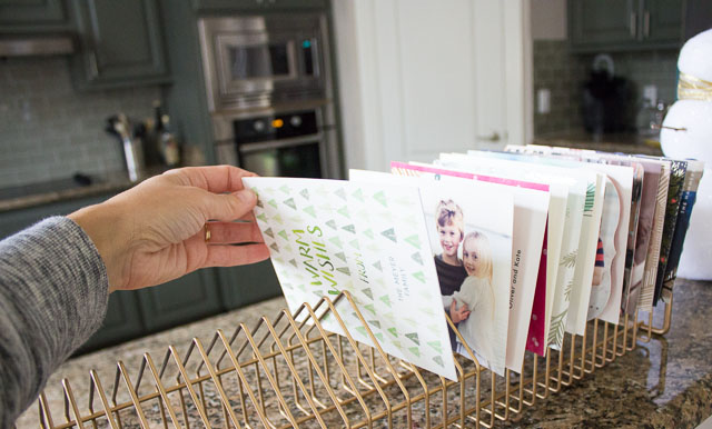 Turn an old CD rack into a modern holiday card display! || http://www.designimprovised.com