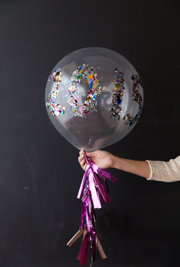 New Years Eve Confetti Balloons - you can customize these to spell anything! || www.designimprovised.com