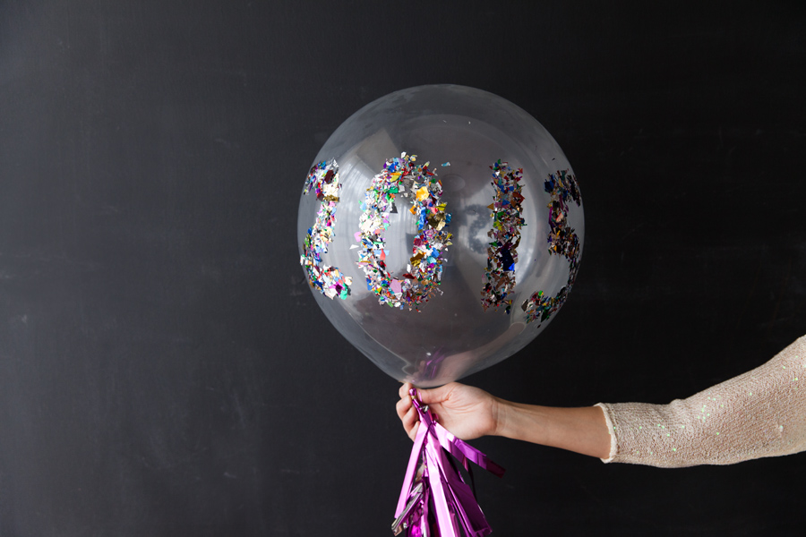 New Years Eve Confetti Balloons - you can customize these to spell anything! || www.designimprovised.com