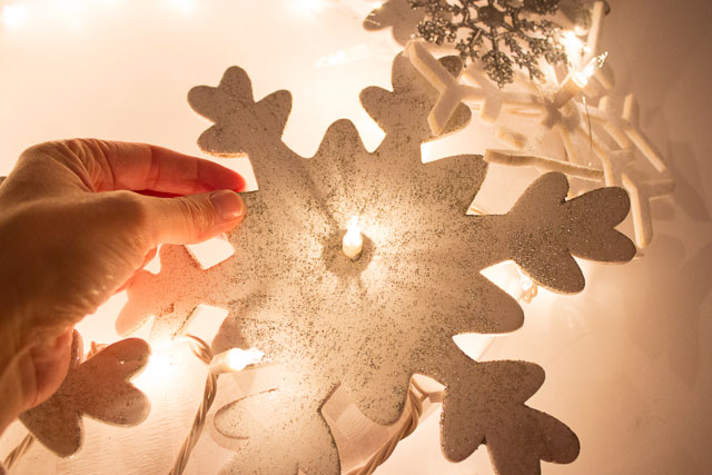 How to push the lights through the foam snowflake ornaments