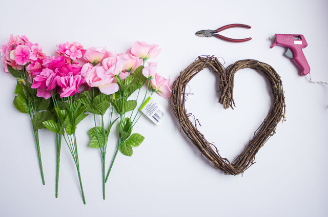 Make these beautiful floral hearts from dollar store flowers! | http://www.designimprovised.com
