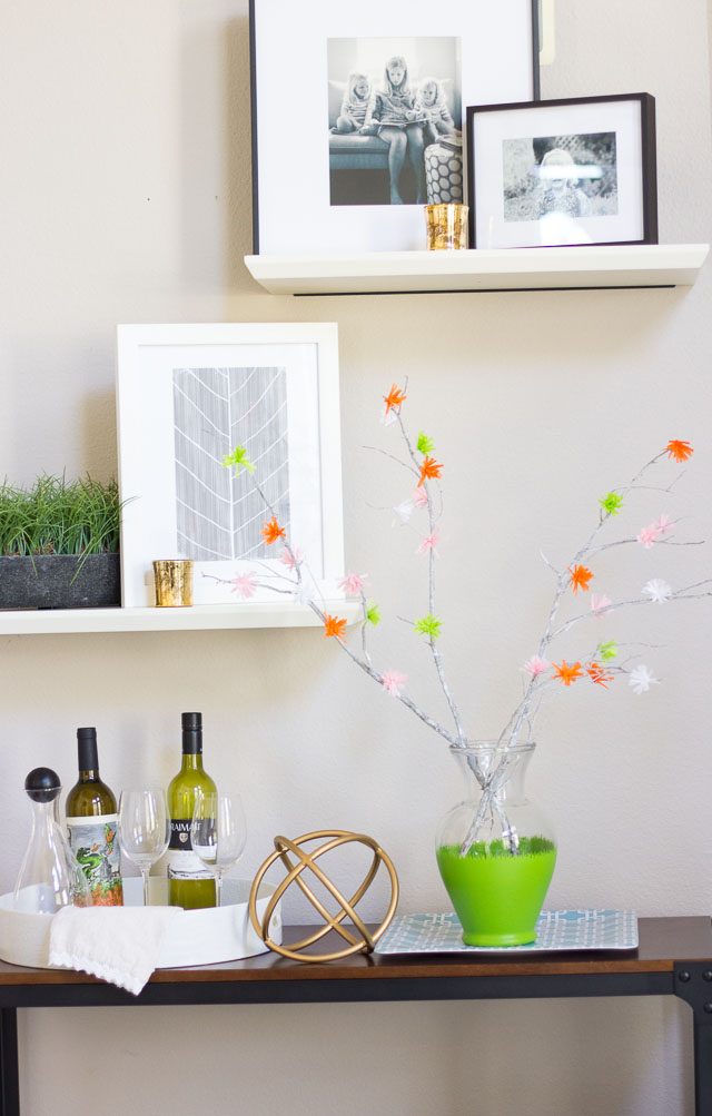 Make these flowering spring branches from party streamers! | http://www.designimprovised.com #12monthsofmartha