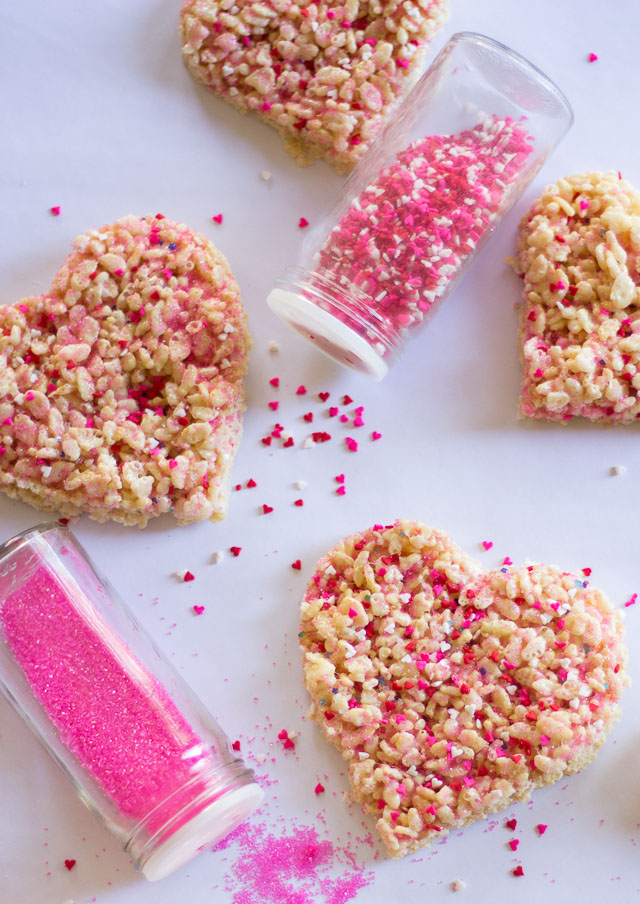 Sprinkled Rice Krispie Hearts - easy enough for your littlest ones to make for a Valentine's Day treat! | http://www.designimprovised.com
