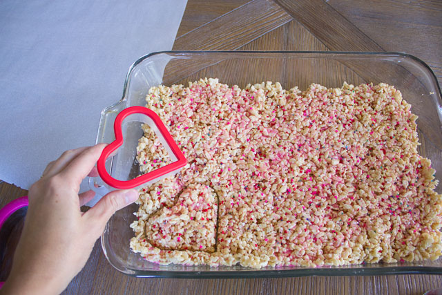 Rice Krispie Sprinkle Hearts - the perfect preschooler activity! Let them go nuts with sprinkles and then cut out with cookie cutters! | http://www.designimprovised.com