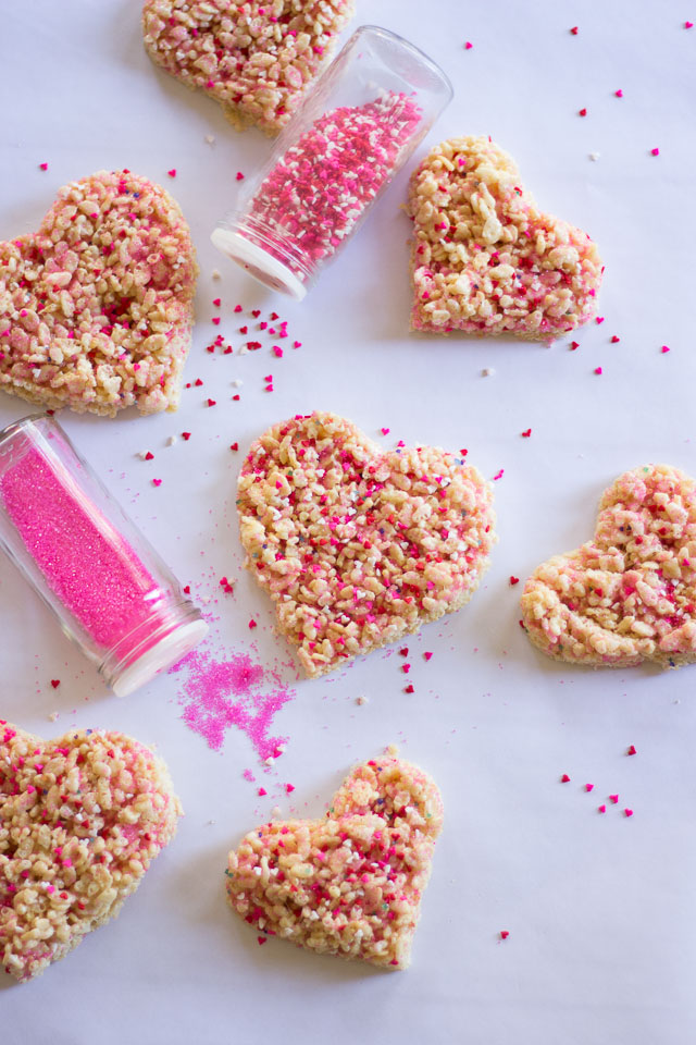 Rice Krispie Sprinkle Hearts - the perfect preschooler activity! Let them go nuts with sprinkles and then cut out with cookie cutters! | http://www.designimprovised.com