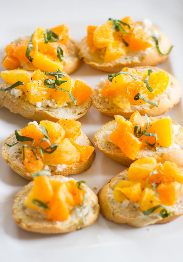 Clementine goat cheese crostini - the touch of black pepper and basil makes them SO good!!