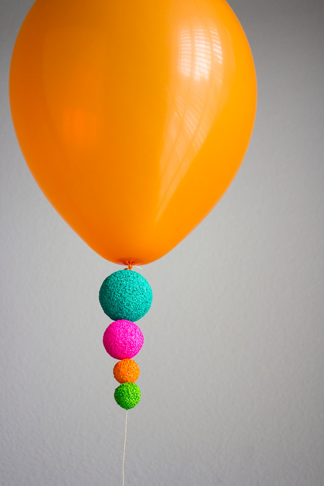 Colorful foam balls make such a cool addition to balloons!