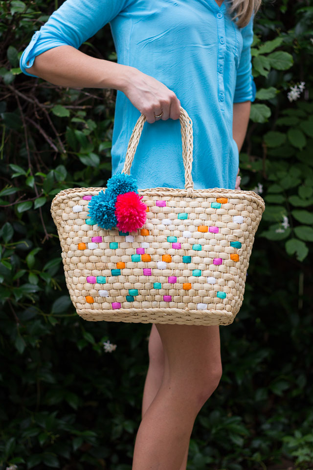 Makeover Your Plain Wicker Beach Tote With a Skien of Pompom Yarn