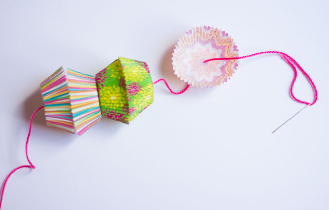 How to string cupcake wrappers onto a balloon