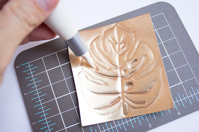 Make these pretty tropical leaf magnets for your fridge!