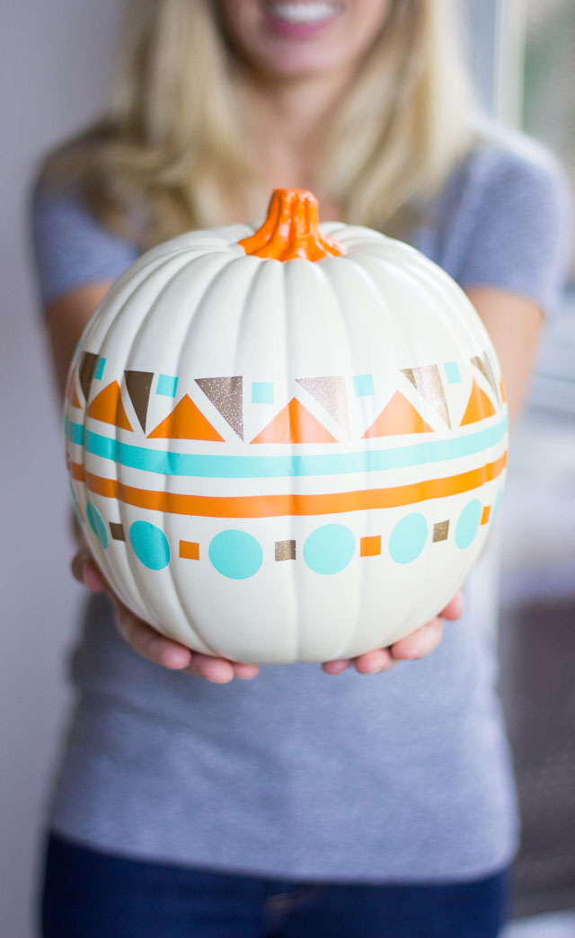 Use colorful vinyl shapes to create a modern geometric pumpkin!