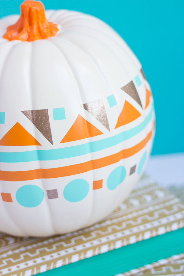 Use colorful vinyl shapes to create a modern geometric pumpkin!