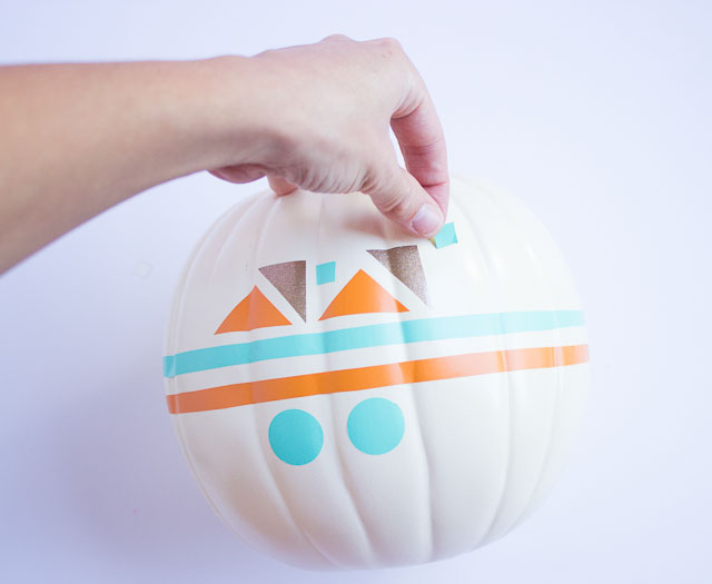Use colorful vinyl shapes to create a modern geometric pumpkin!