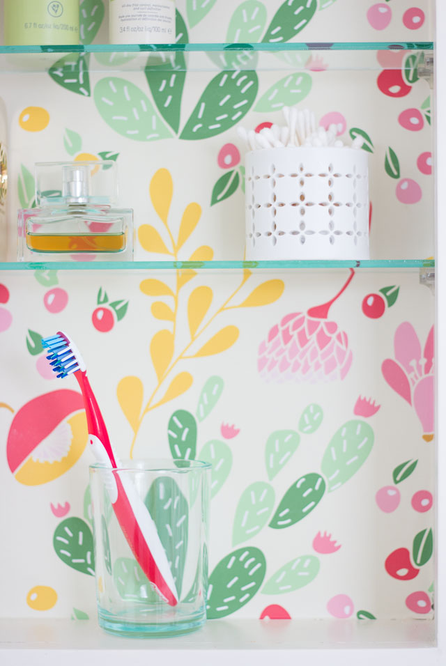 Makeover a medicine cabinet with peel and stick wallpaper!
