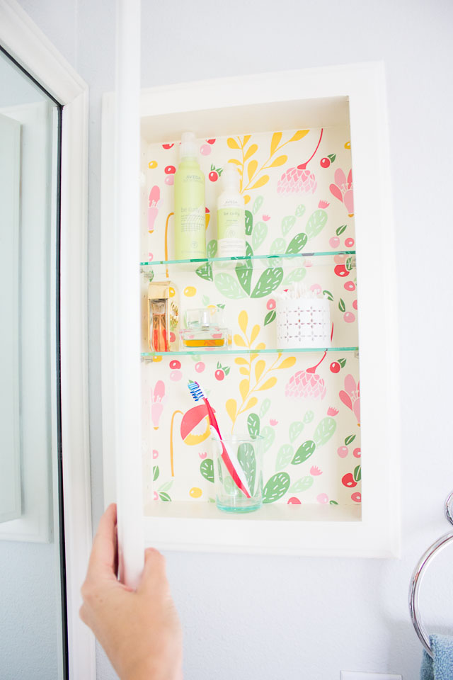 Makeover a medicine cabinet with peel and stick wallpaper!