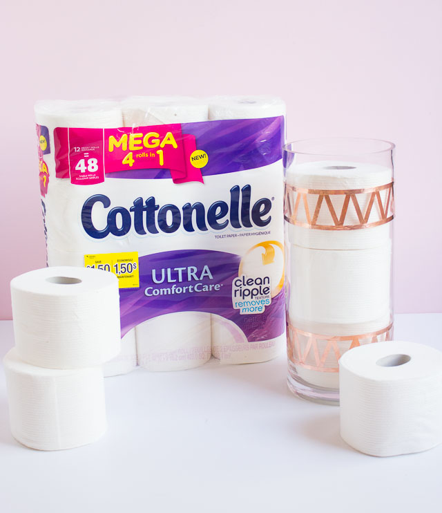 Transform an old vase into chic toilet paper storage!