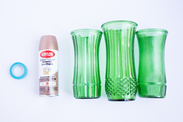 Dip thrift store vases in metallic paint for a modern look!