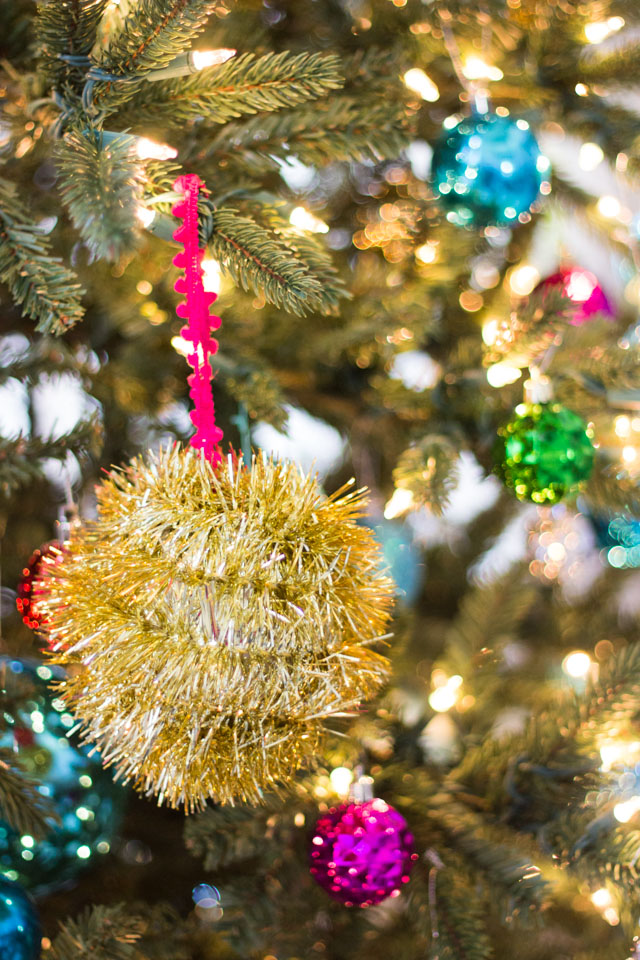 Homemade Christmas ornaments with tinsel garland