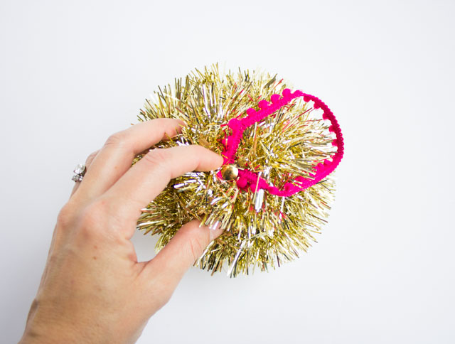 Homemade Christmas ornaments with tinsel garland
