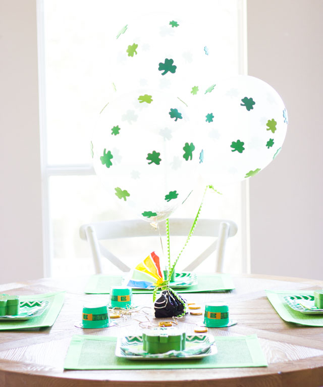 These DIY shamrock balloons are decorated with stickers! Easy enough for kids to make for a St. Patrick's day party!