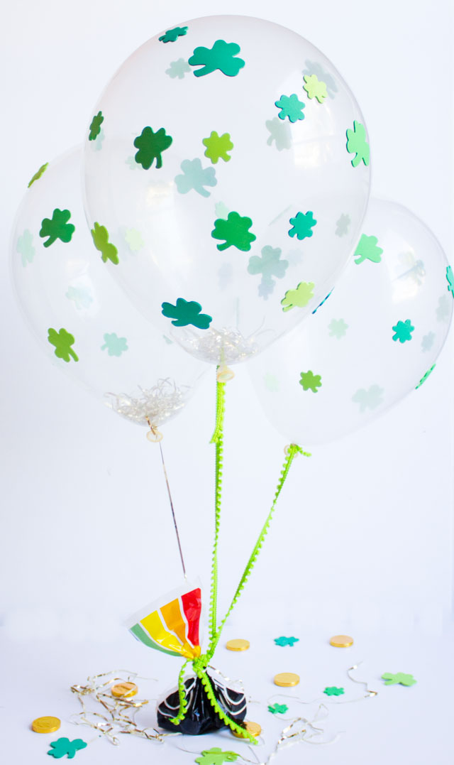 These DIY shamrock balloons are as simple as peel and stick! Make a bunch for your St. Patrick's Day party decor or table centerpiece