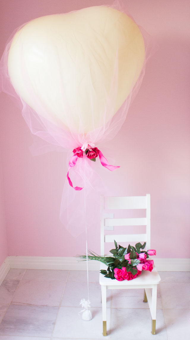 Cover giant heart balloons in tulle for a gorgeous effect!