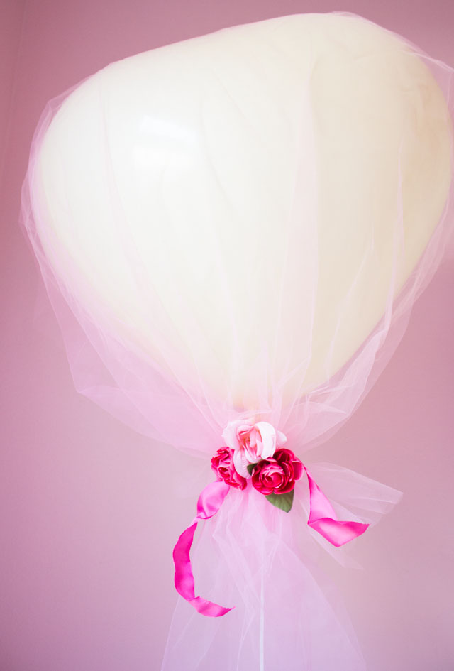 Cover giant heart balloons in tulle for a gorgeous effect!