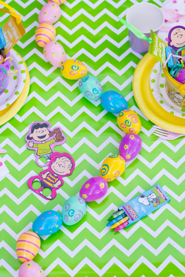 Make a simple DIY Easter table runner with plastic Easter eggs!