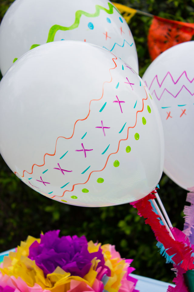 Fiesta balloons! Just doodle on with Sharpies to make them look like maracas!