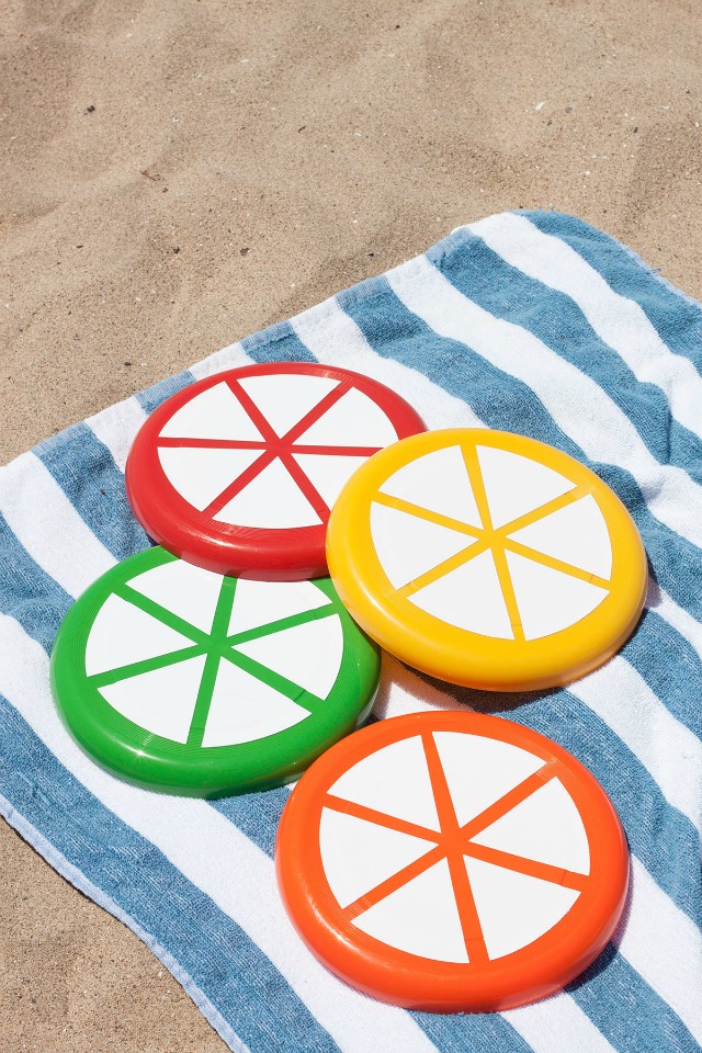 Turn frisbees into citrus slices - perfect for the beach!